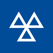 The MOT symbol is a blue background and three white triangles joined together