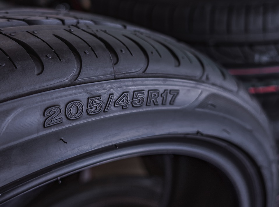 black tyre with tyre markings 205/45R17