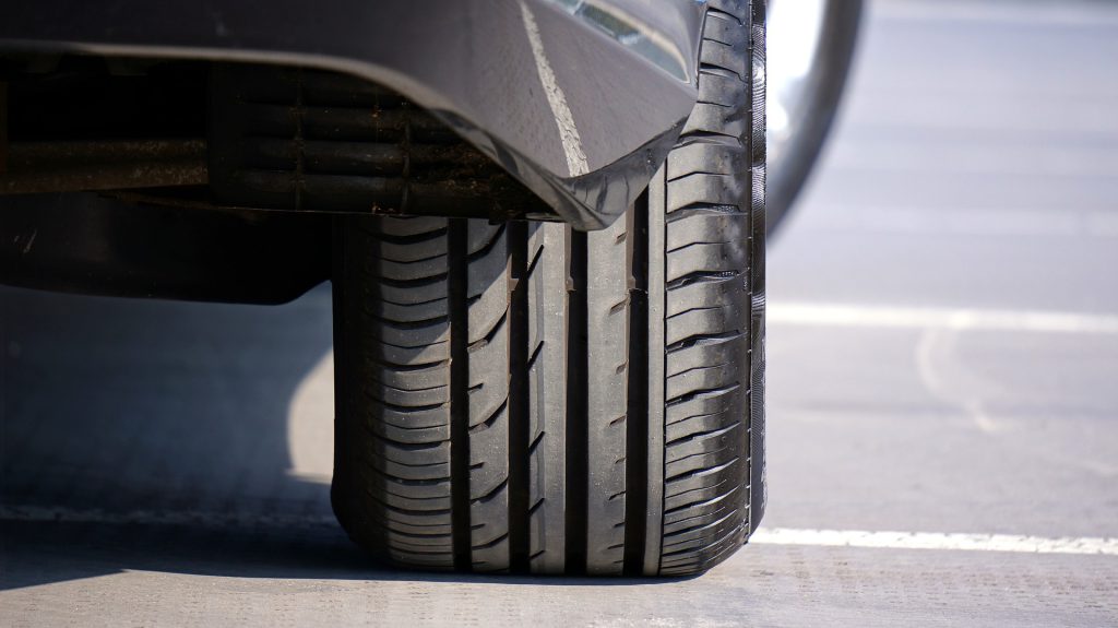 Close up of a back wheel car tyre