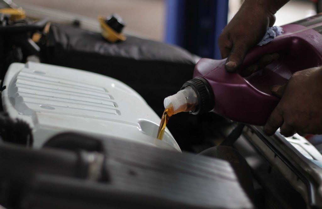 Oil being poured into engine
