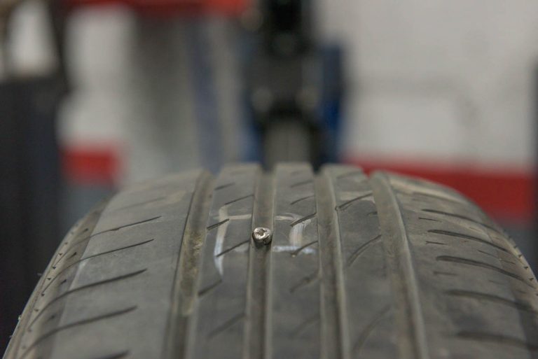 A tyre with a screw in it awaiting repairs at Motorvation Northampton.